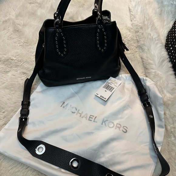 Michael Kors pebble, leather mini tote gently used kept in a dust bag